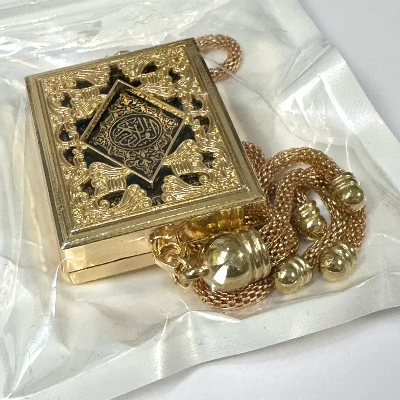 Mini koran i metalæske, guld