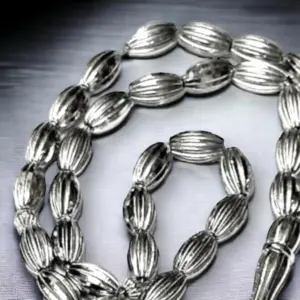 Tasbih i metal i mandellformet perler, 33 perler